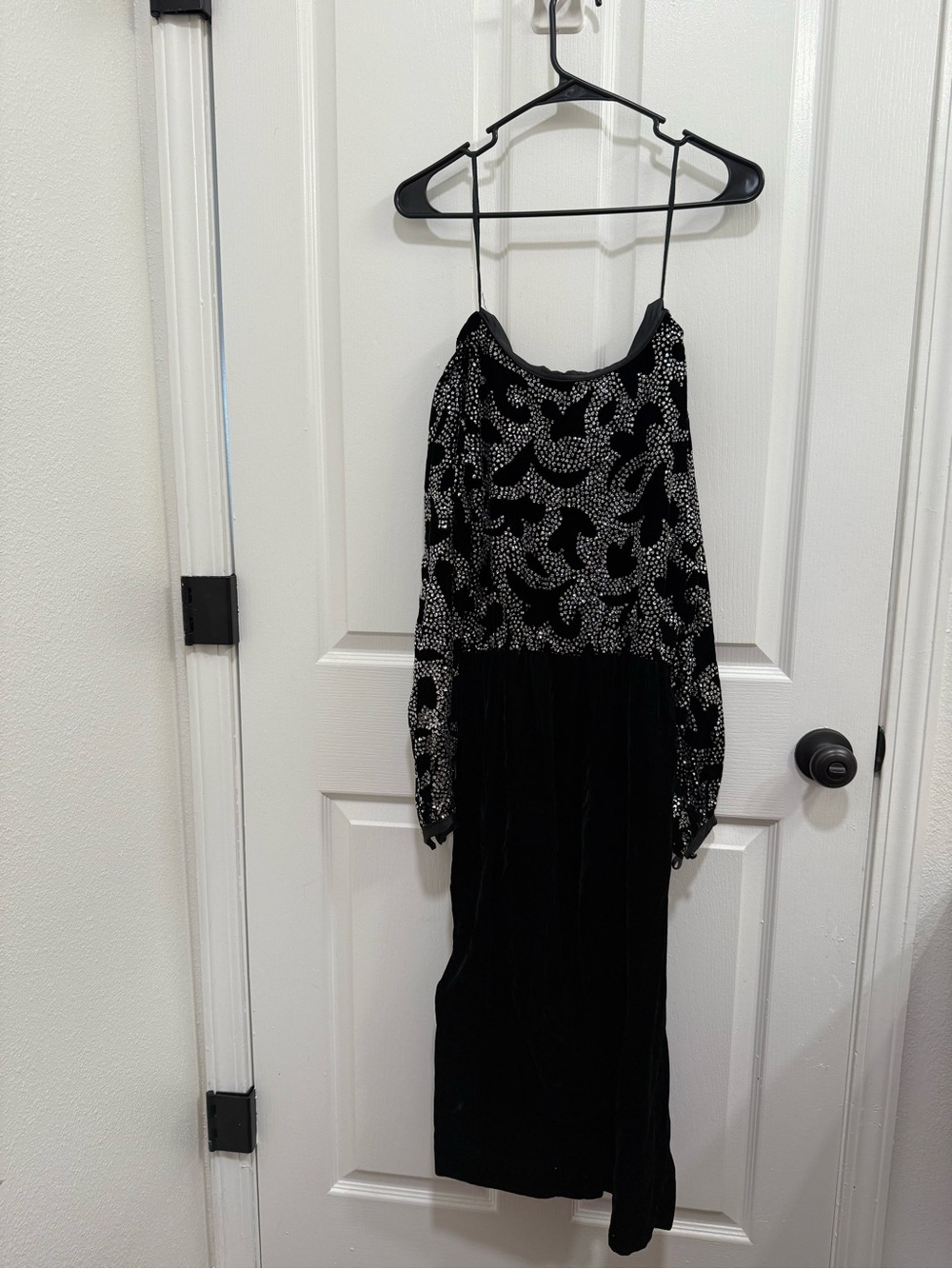 Elegant Black Long-Sleeve Maxi Dress with Silver Sequin Detail